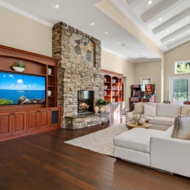 Great Room with Vaulted Ceilings & Stone Fireplace